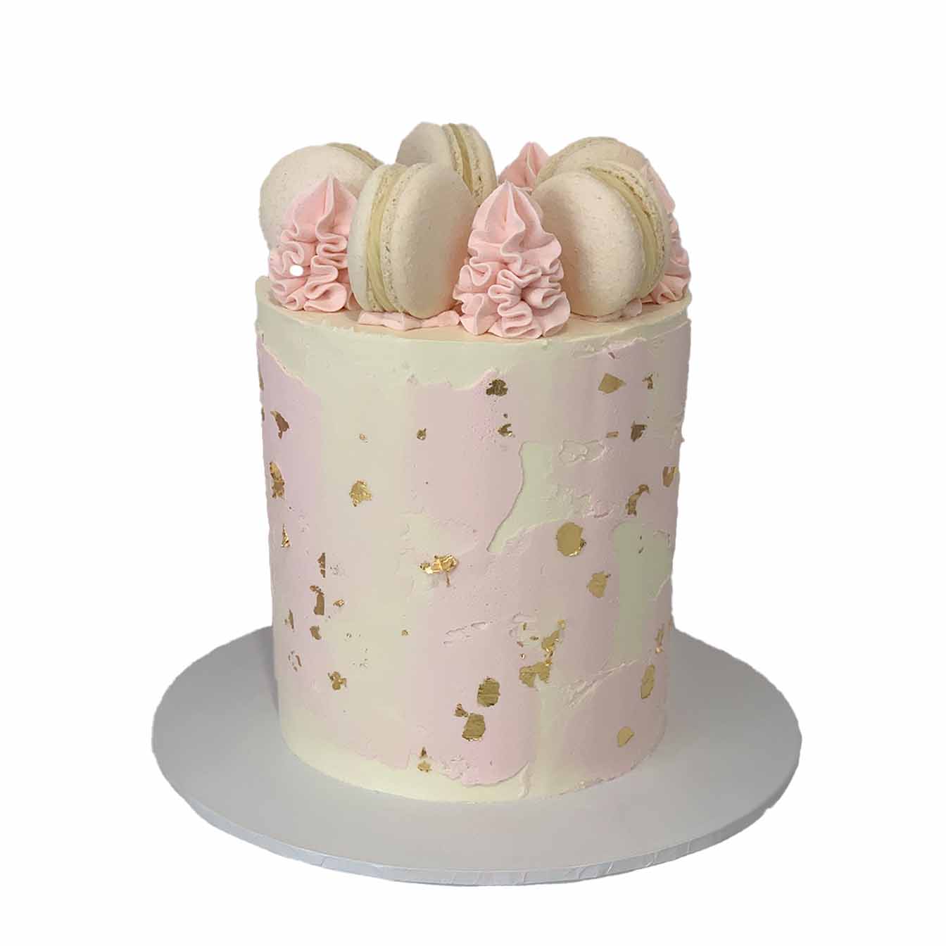 Elegant Pink and Gold Delight Cake - A double-height cake with pink overlay icing, gold leafing, vanilla macarons, and exquisite piping, a luxurious centerpiece for elegant celebrations.